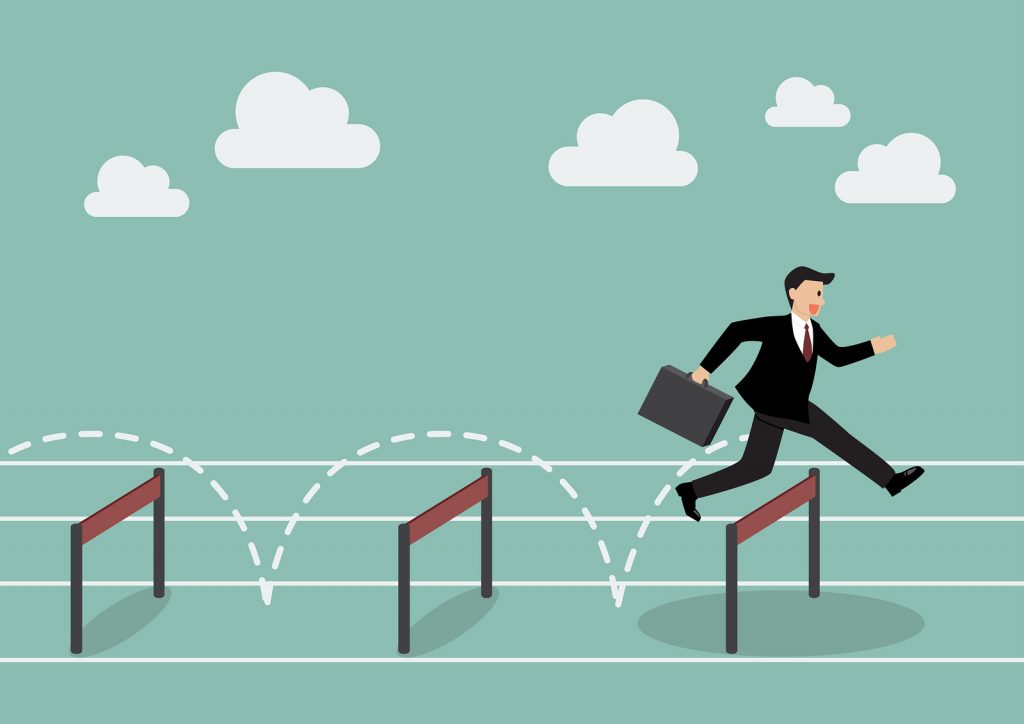 Businessman jumping over hurdle. Business competition concept